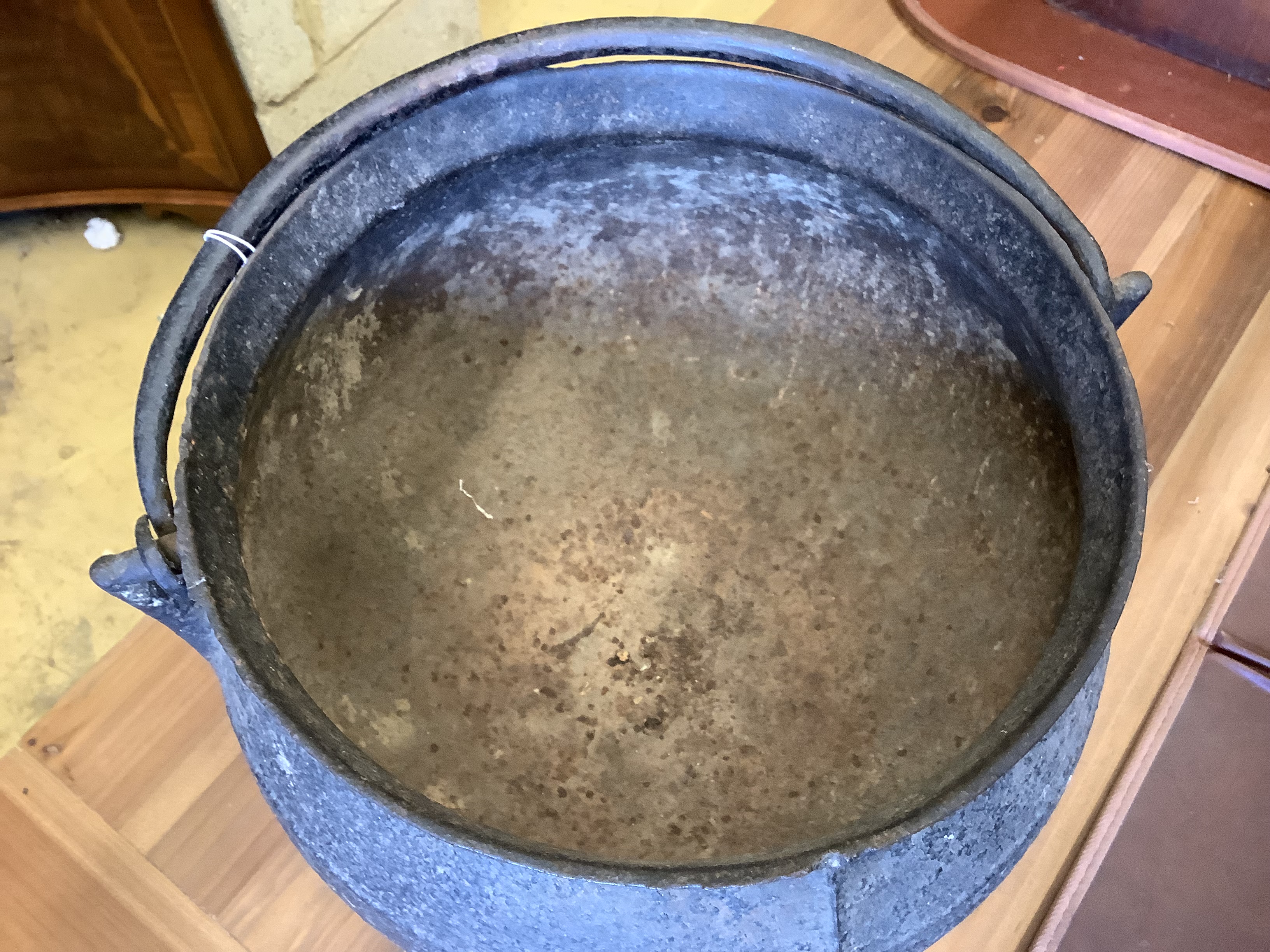 A cast iron cauldron, diameter 31cm, height 28cm